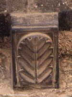 CANECILLO MURO NORTE: PALMETA